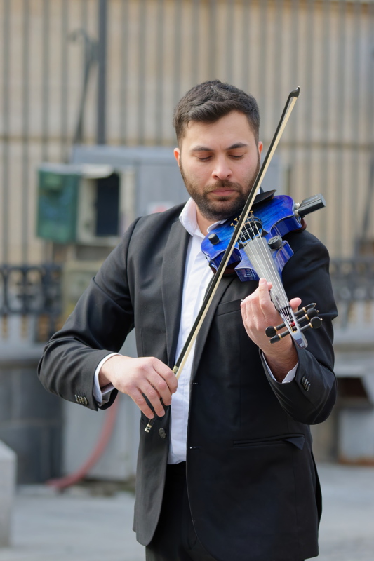 Young man playing violin 2